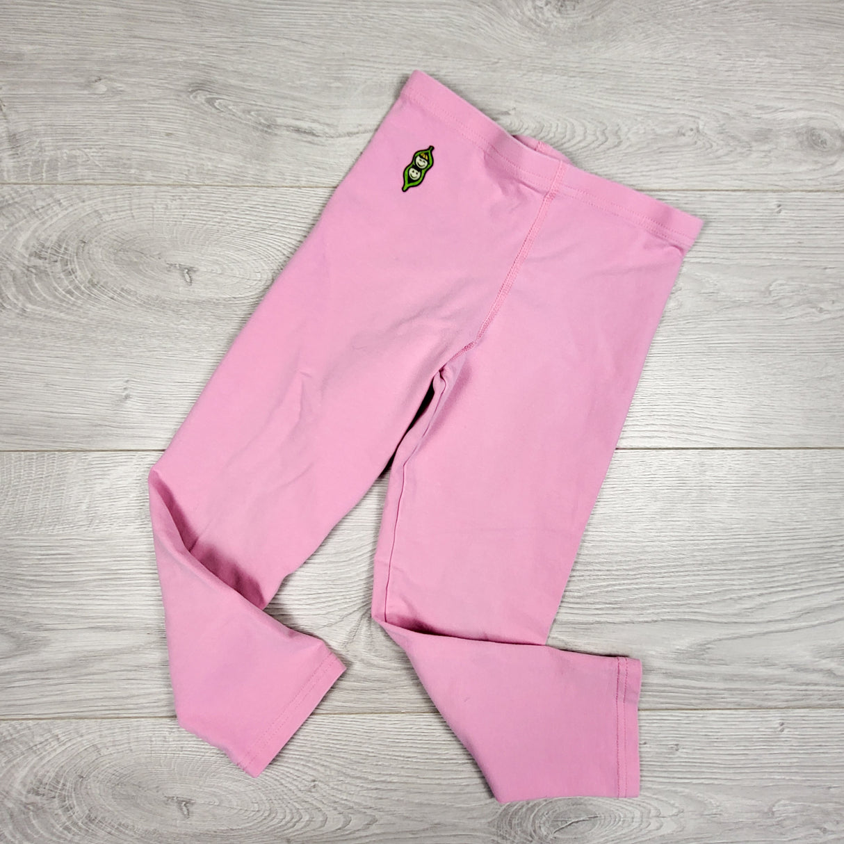 Peekaboo Beans pink capri leggings. Size 7