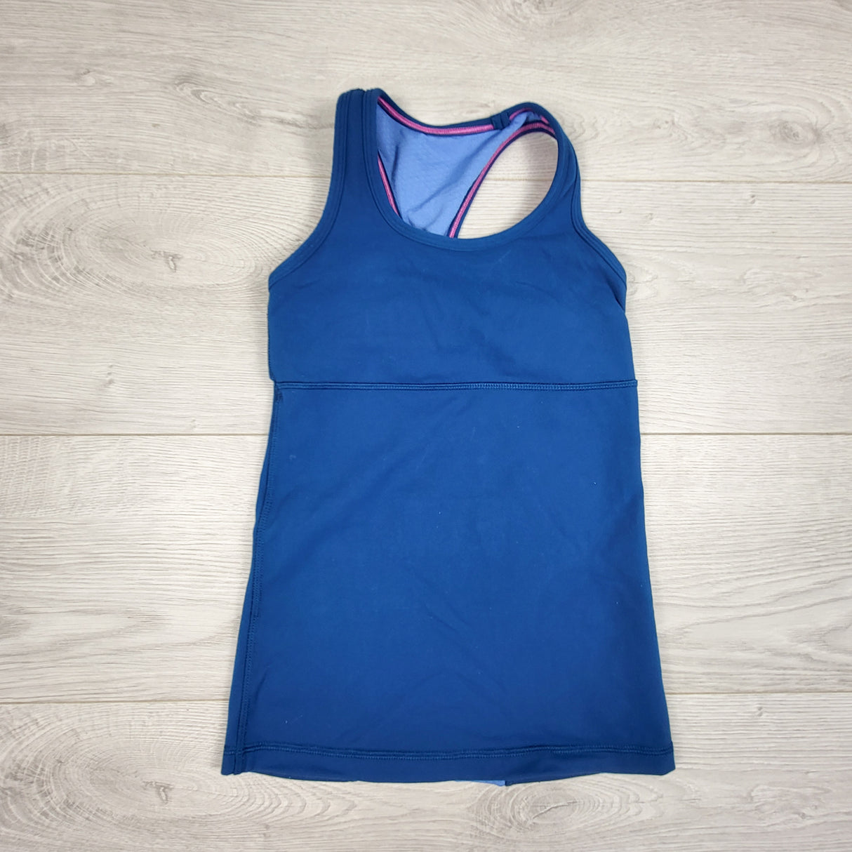 Ivivva (Lululemon) dark blue racerback tank top with built in bra. Size 6