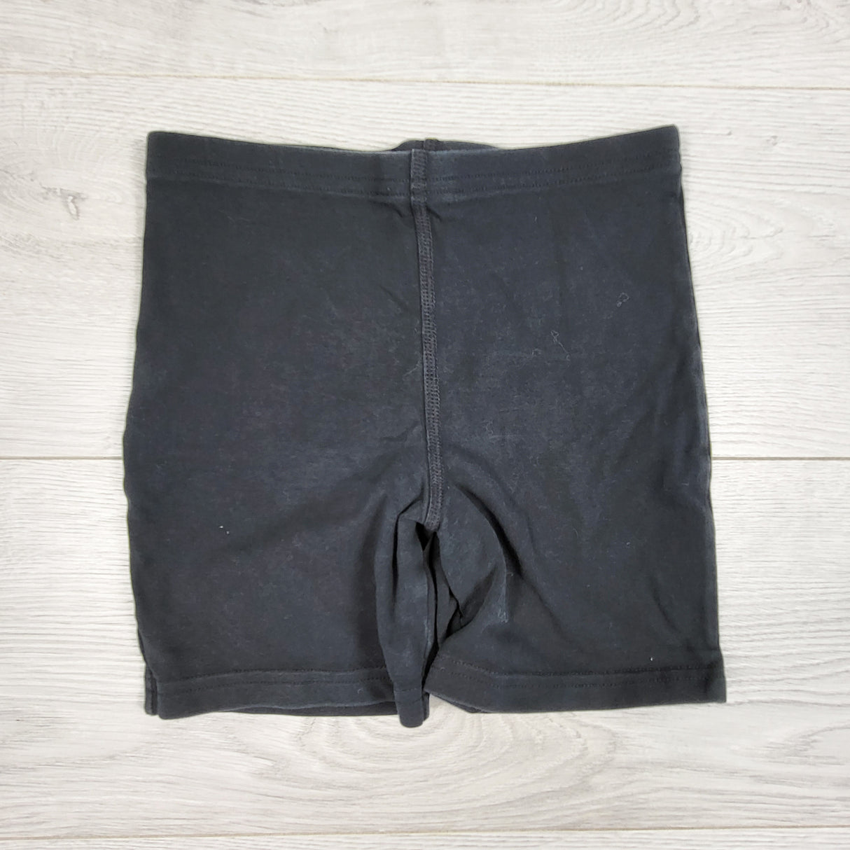 Peekaboo Beans black bike shorts. Size 7
