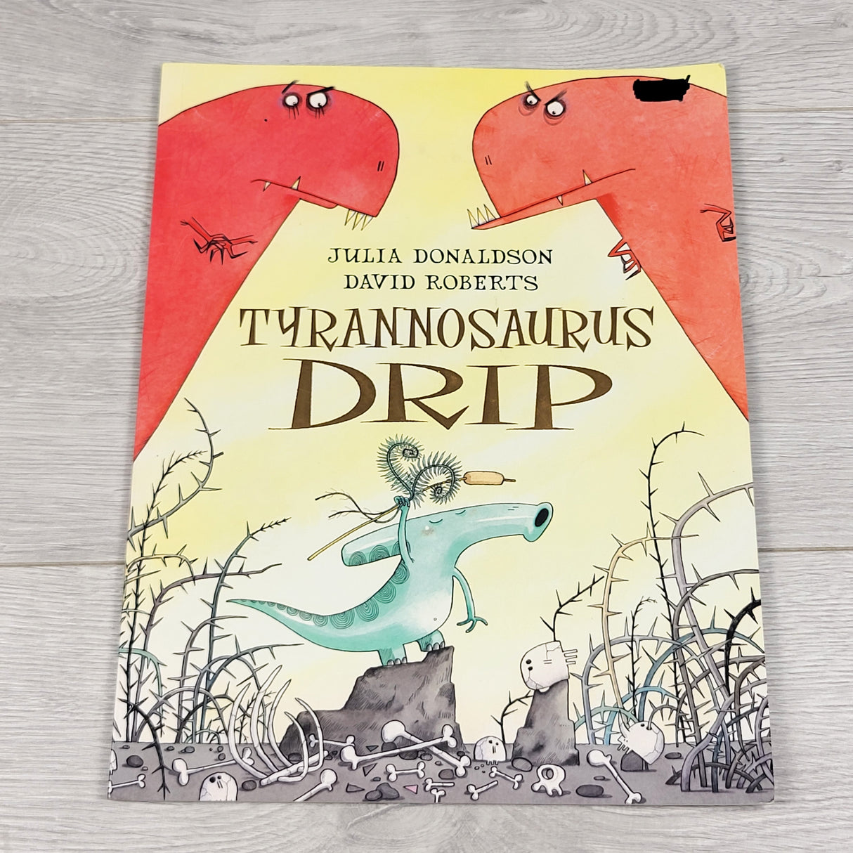 Tyrannosaurus Drip. Soft cover book