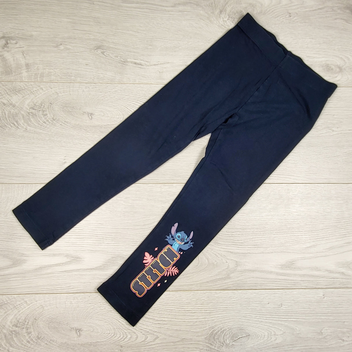 Navy Lilo and Stitch leggings. Size 4-6 years