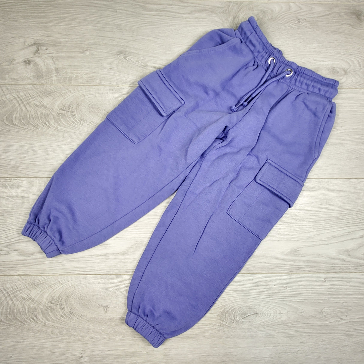 George purple fleecy lined caargo sweat pants. Size 5/6