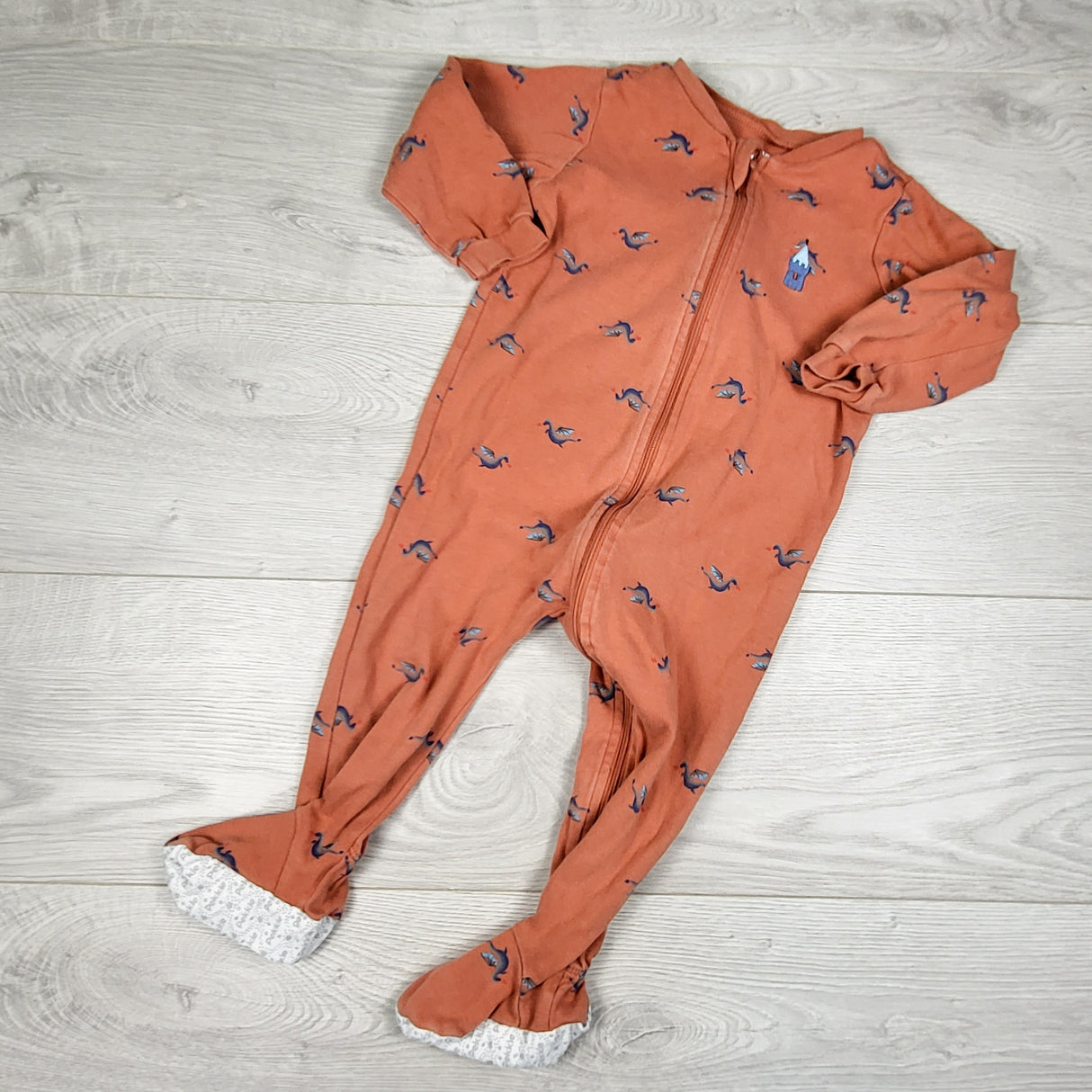 Pekkle muted orange zippered sleeper with dragons. Size 18 months