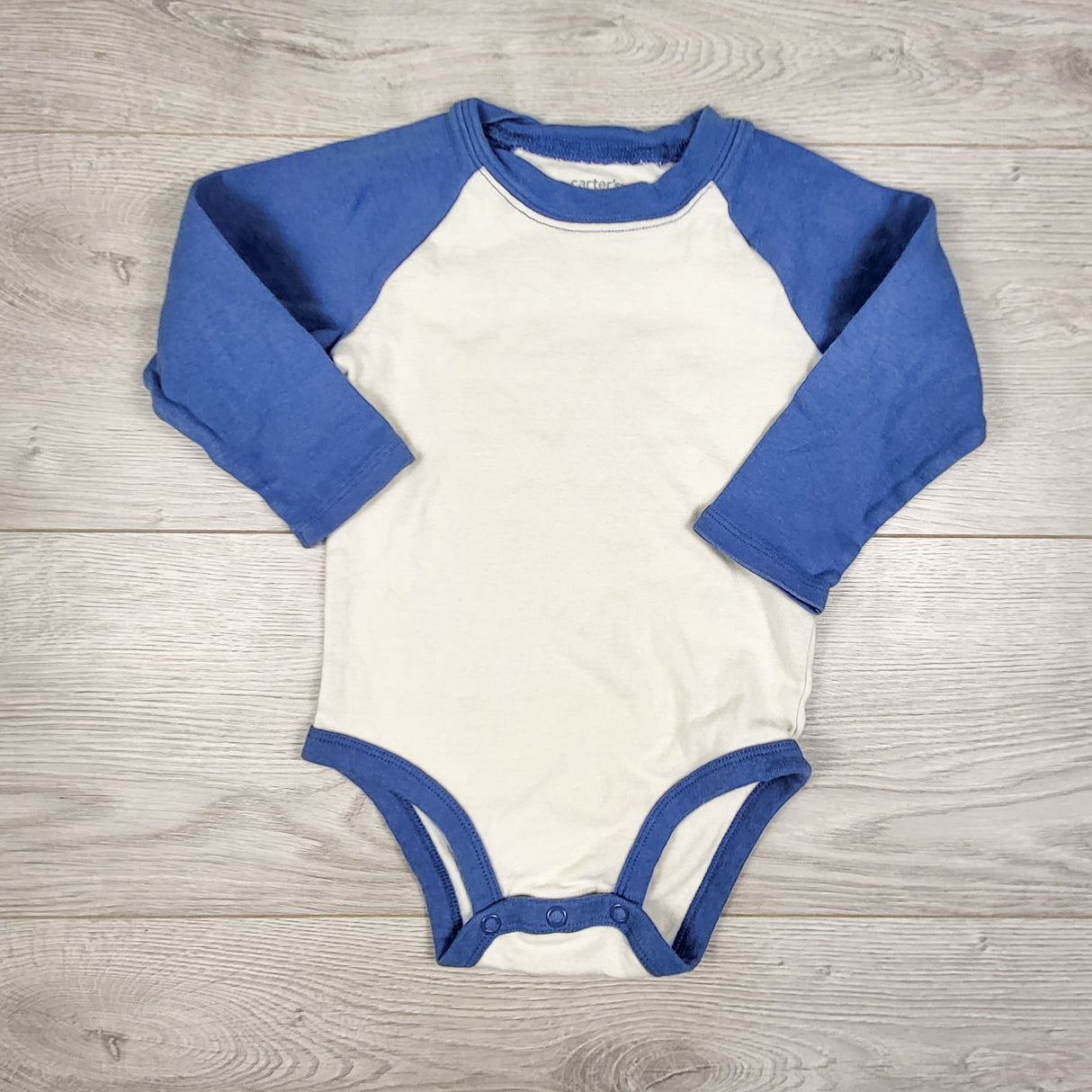 Carters cream and blue raglan style bodysuit. Size 18 months