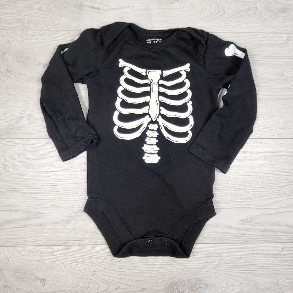 Children's Place black skeleton bodysuit. Size 12-18 months