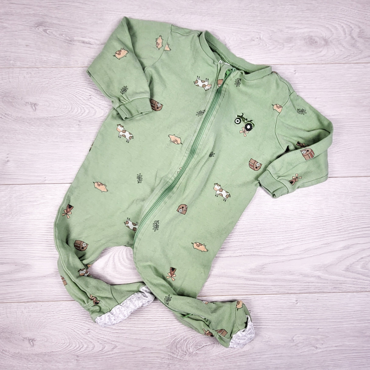 Pekkle green zippered sleeper with farm theme. Size 12 months