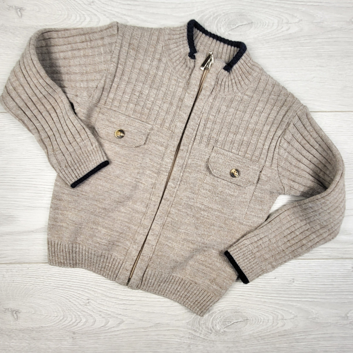 Lightweight grey zip up sweater. Size 6-9 months