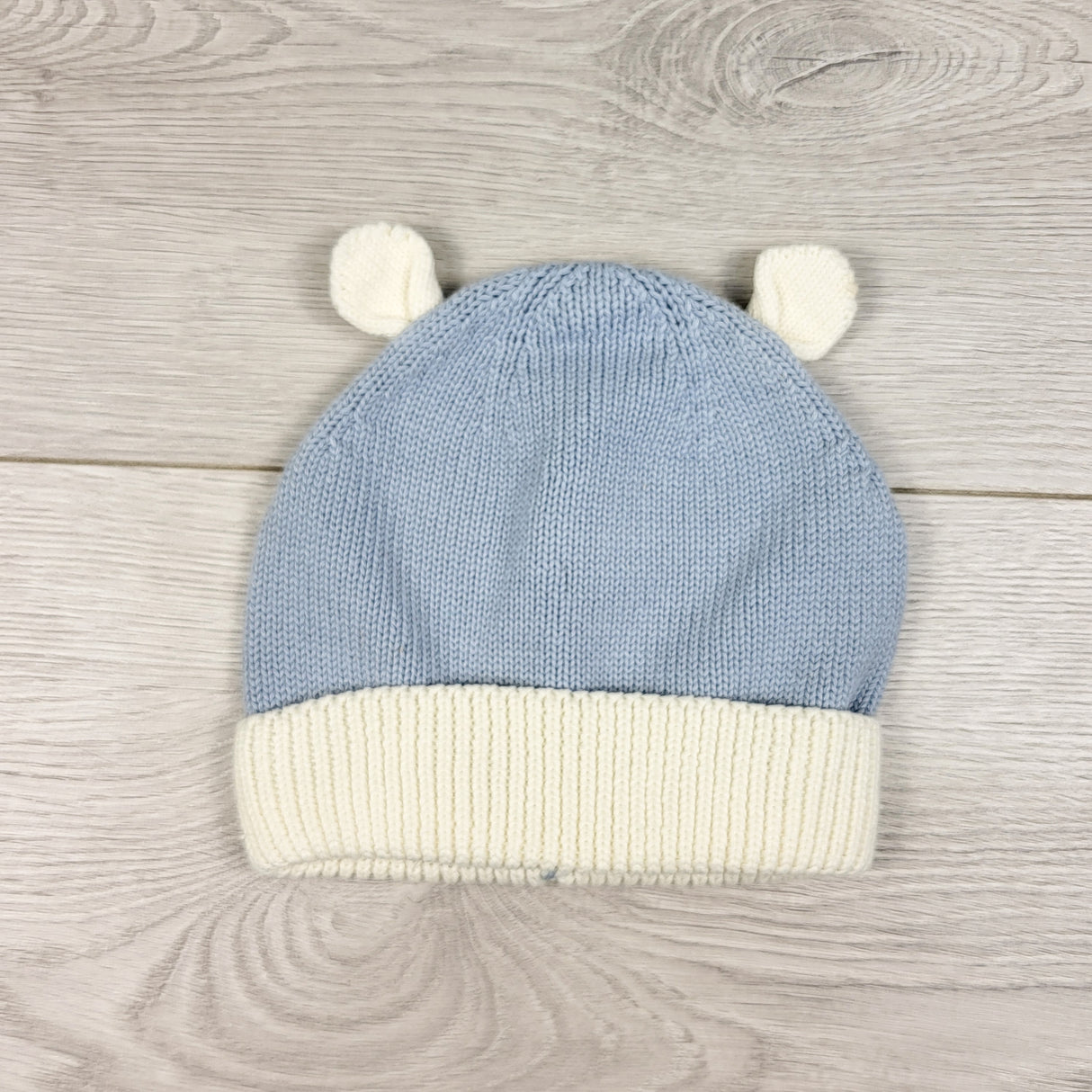 Little Earthling blue knit hat. Size 6-12 months