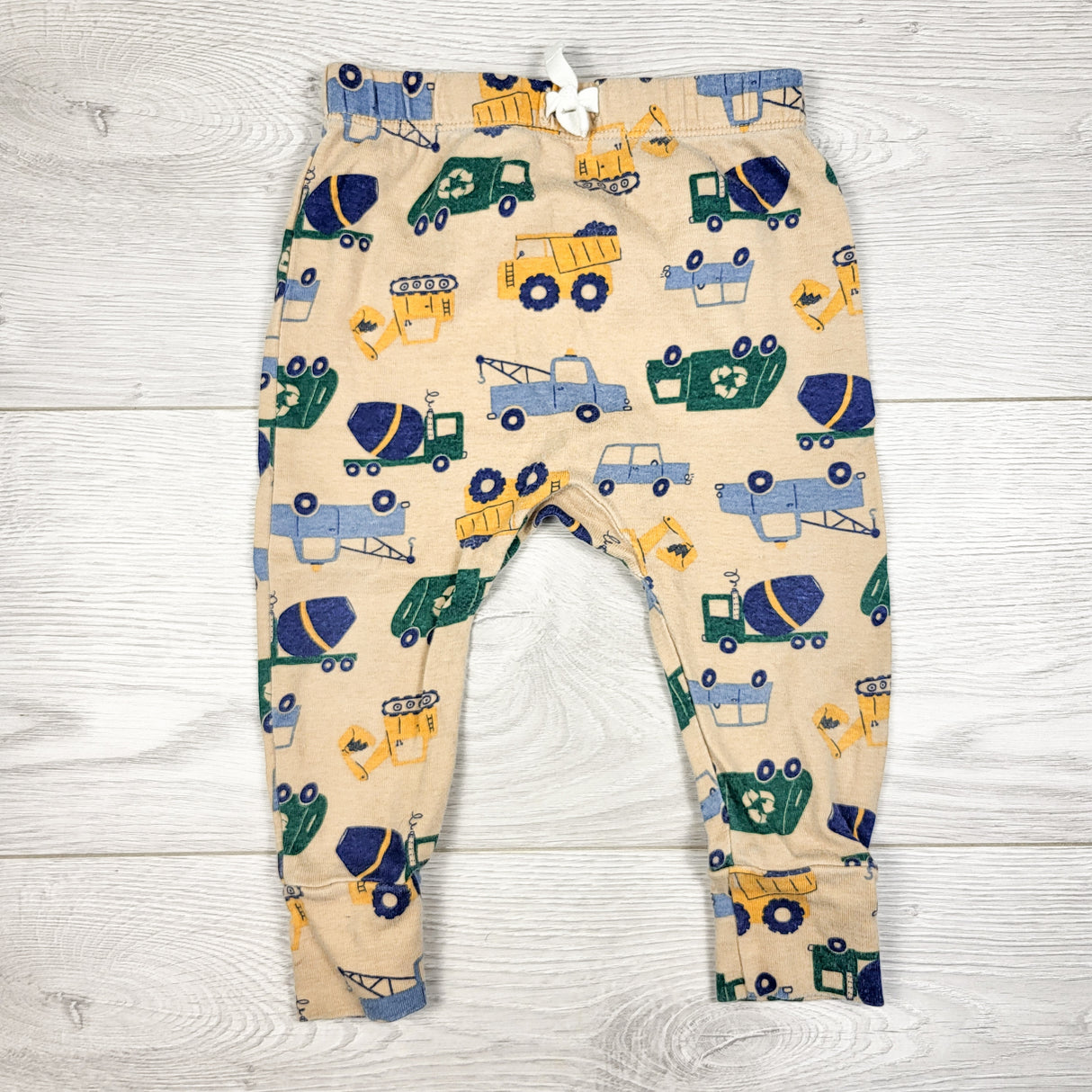 Joe dark beige pants with construction theme. Size 6-12 months
