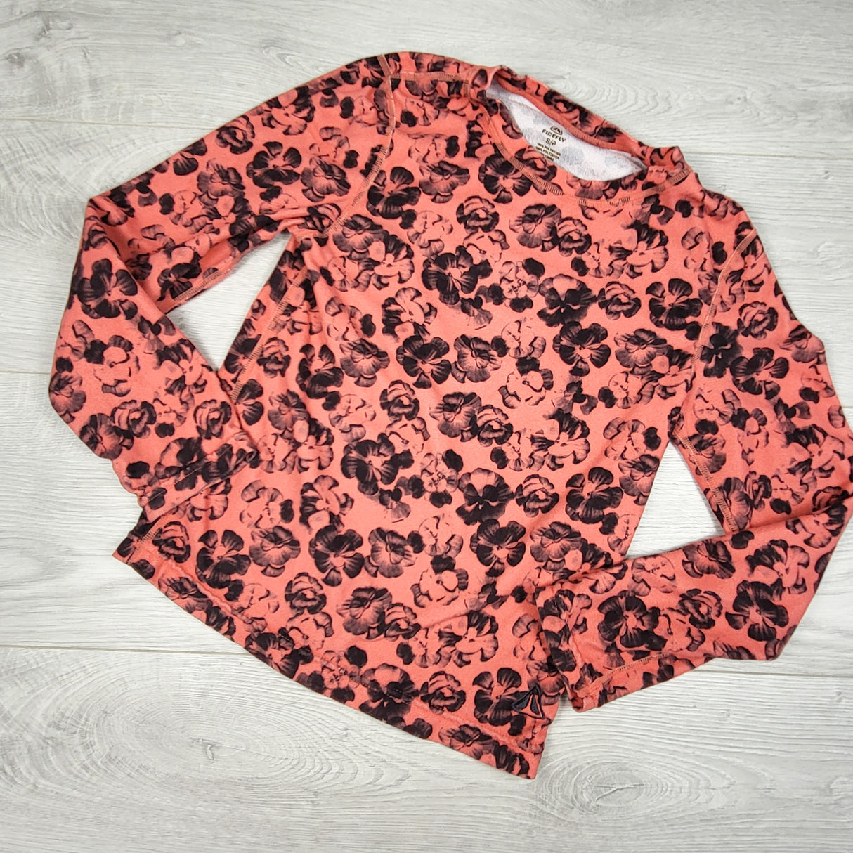 Firefly pink micro fleece base layer with flowers. Size small (6/7ish)