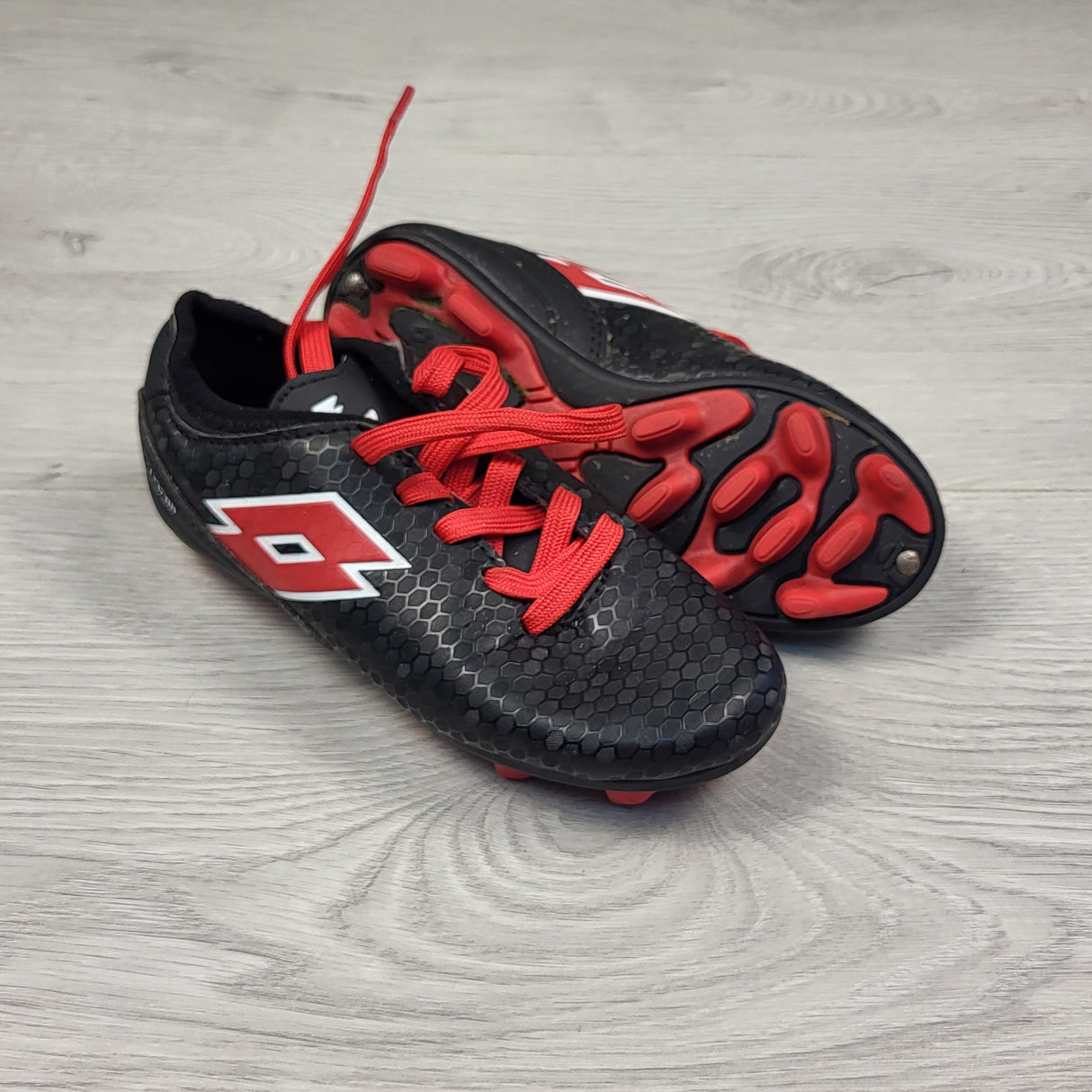 Lotto black and red soccer cleats. Size 10