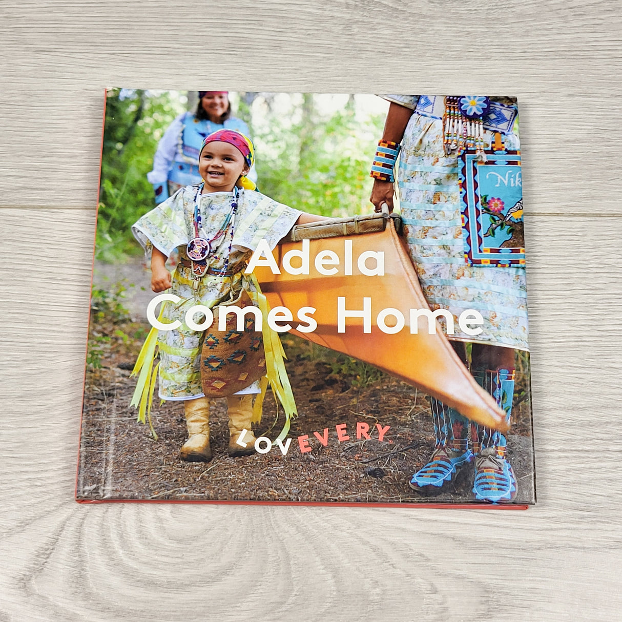 Adele Comes Home. Hardcover Lovevery book