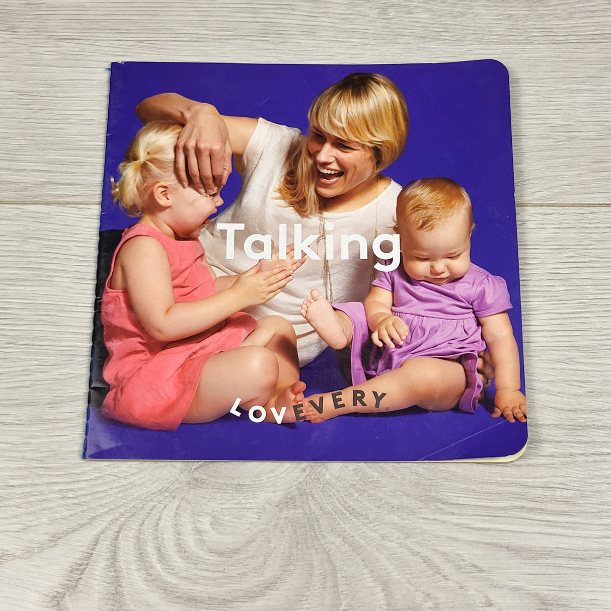 Talking. Soft cover Lovevery book