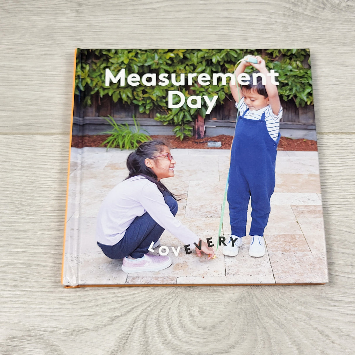 Measurement Day. Hardcover Lovevery book