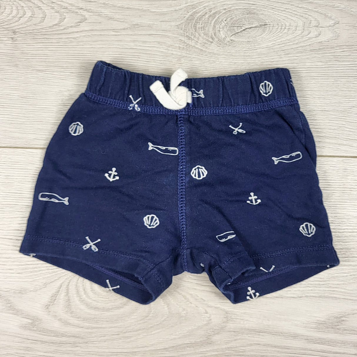 Carters navy shorts with nautical themed. Size 6 months