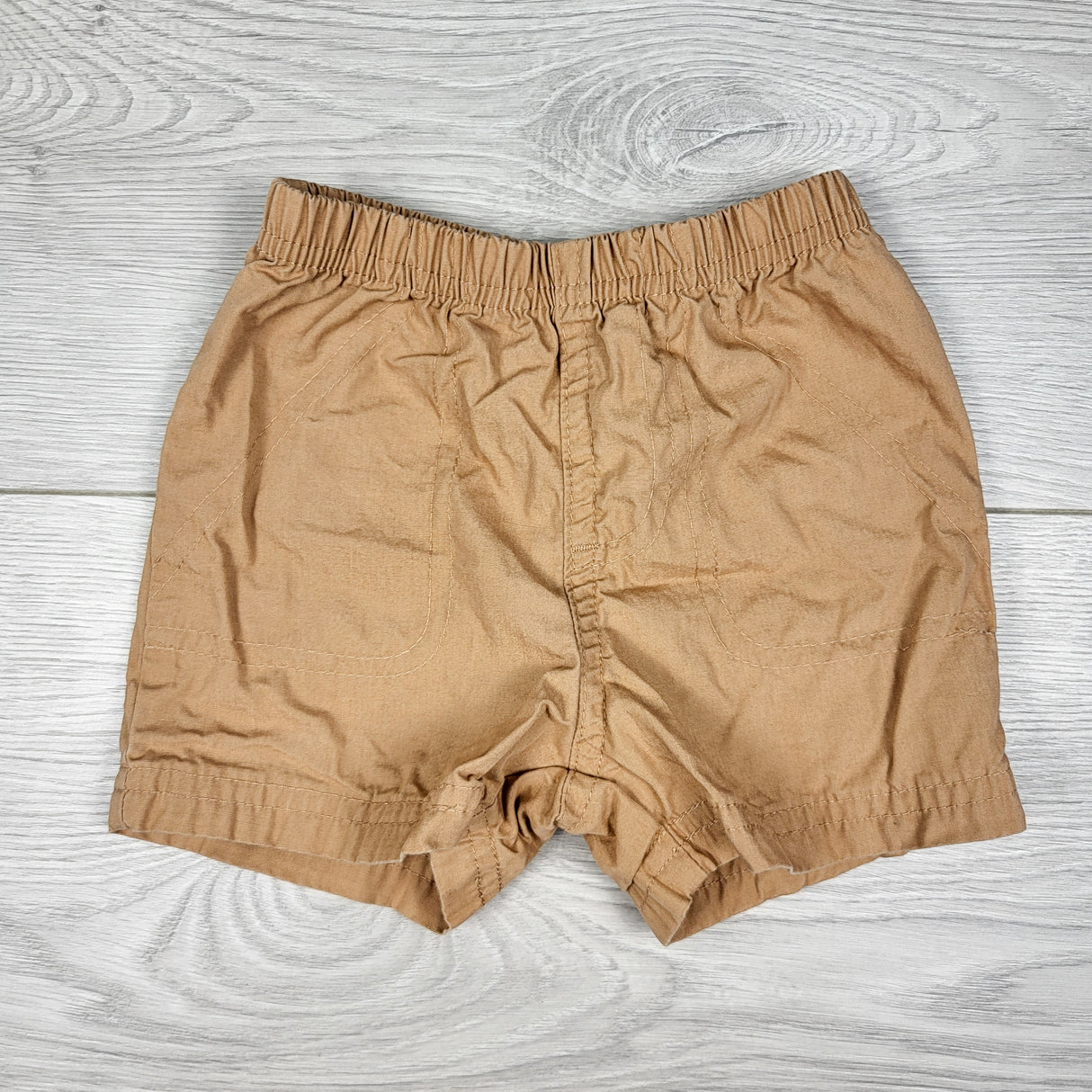 Carters lightweight brown shorts. Size 6 months