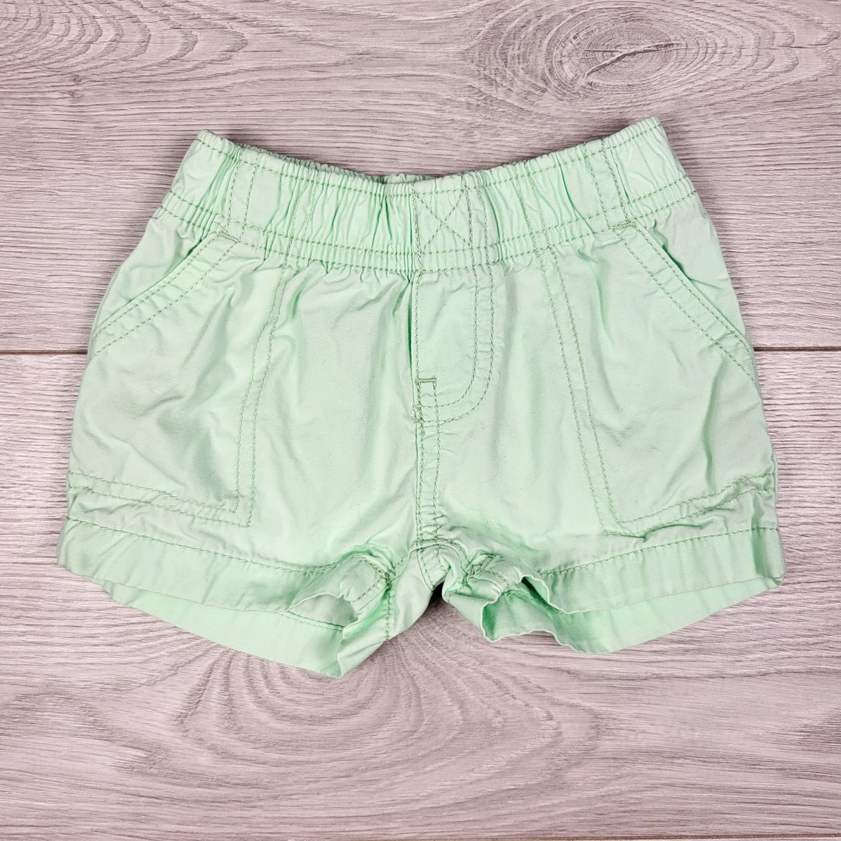 Carters light green shorts. Size 3 months