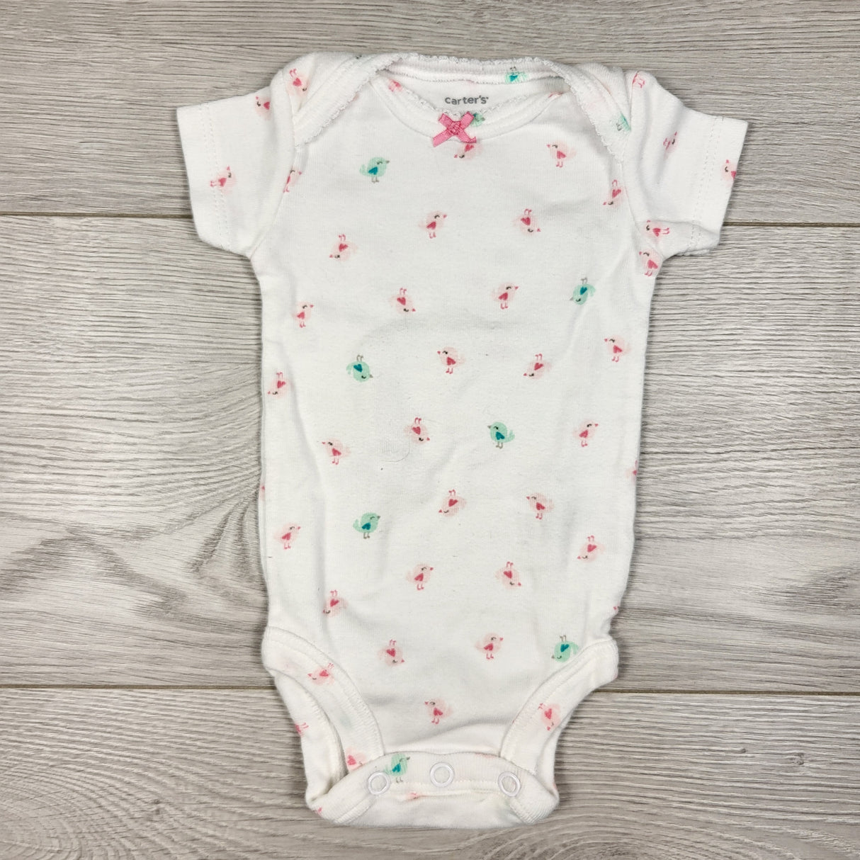 Carters white bodysuit with birds. Newborn size
