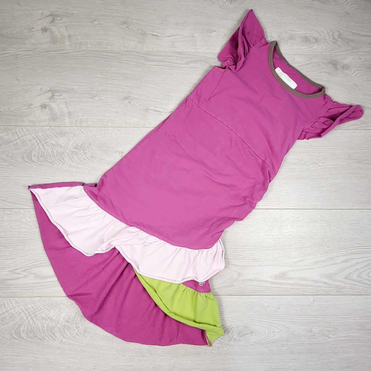 Peekaboo Beans pink ruffle dress with green accent. Size 8
