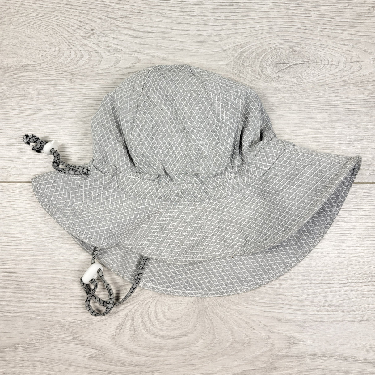 Twinklebelle grey patterned sun hat. Size medium (6-24 months)