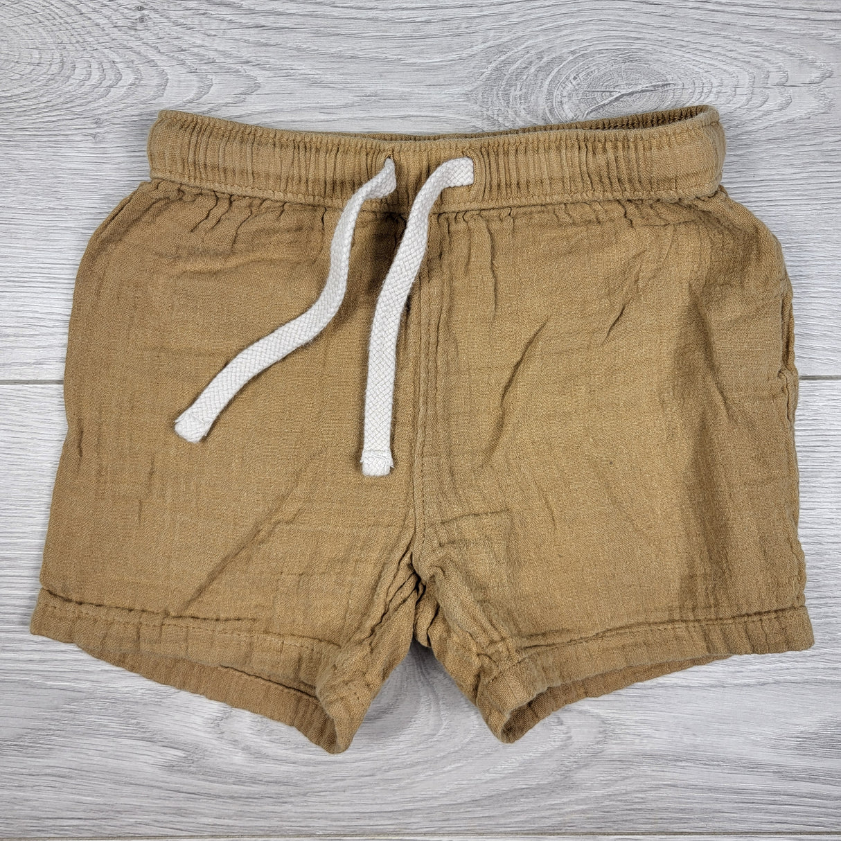 Old Navy tan muslin cotton drawstring shorts. Size 18-24 months