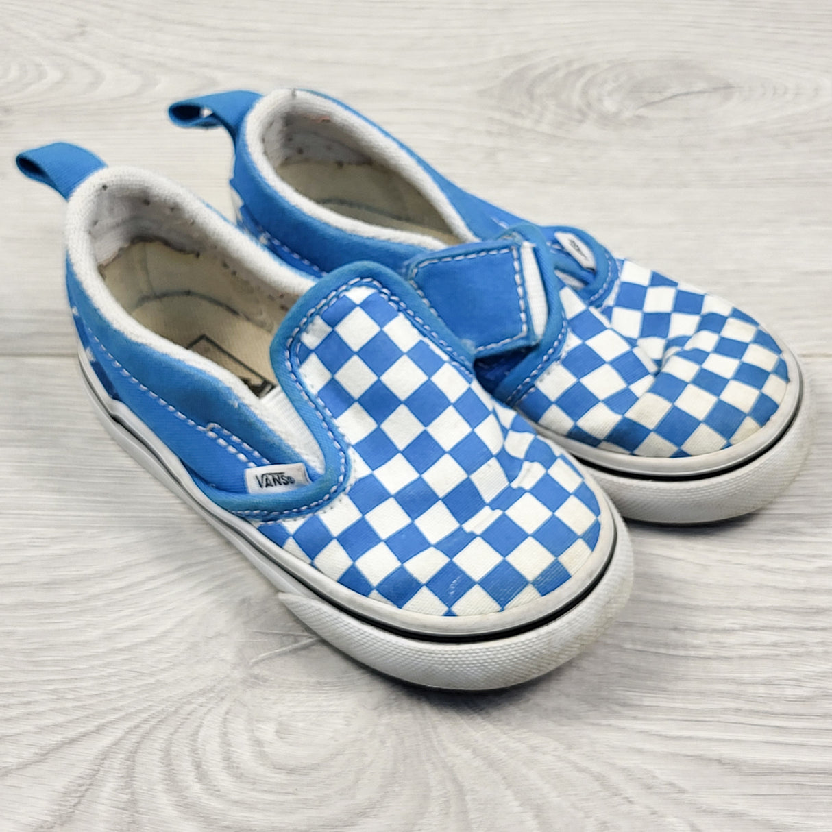 Vans blue checkerboard slip-on canvas shoes. Size 7 (toddler)