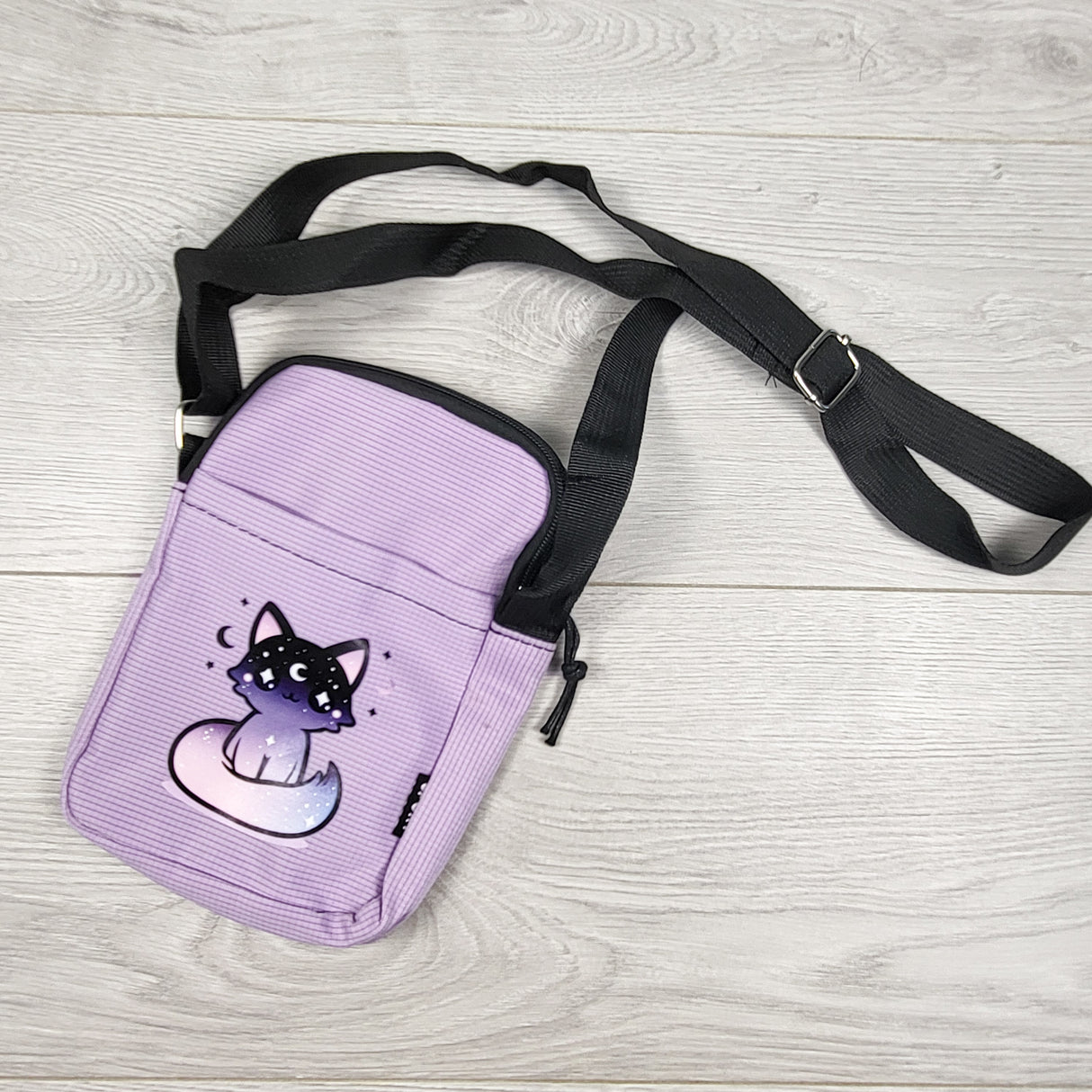 Purple crossbody bag with cat