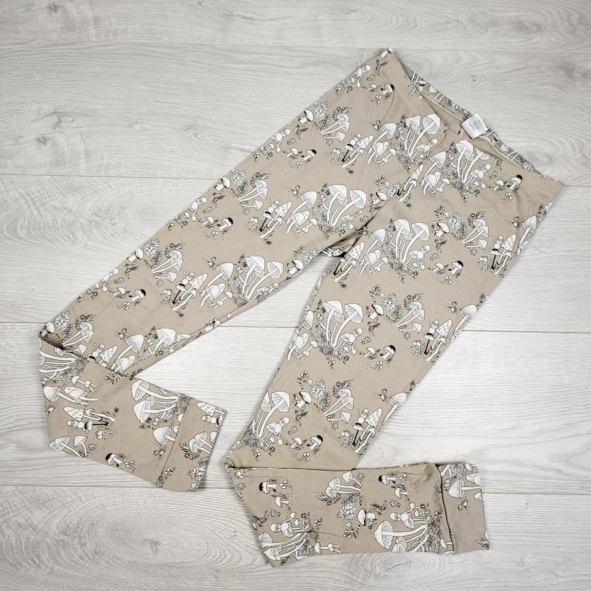 Little and Lively beige mushroom print bamboo leggings. Size 13/14