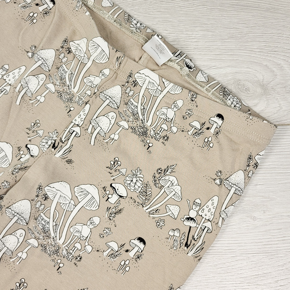 Little and Lively beige mushroom print bamboo leggings. Size 13/14