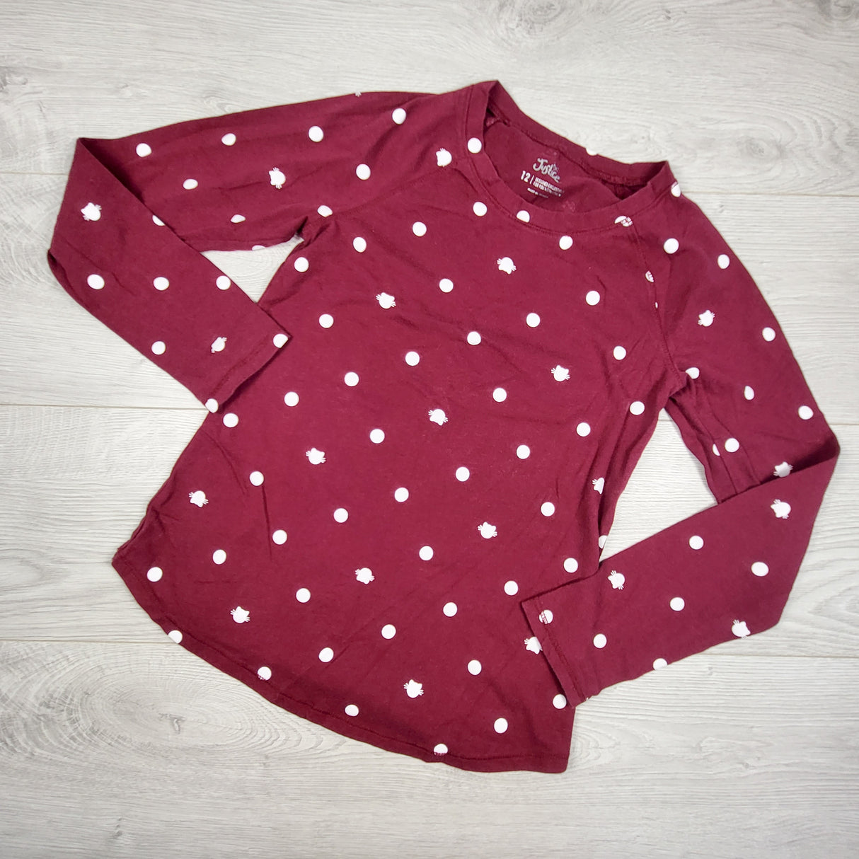 Justice burgundy polka dot top. Size 12