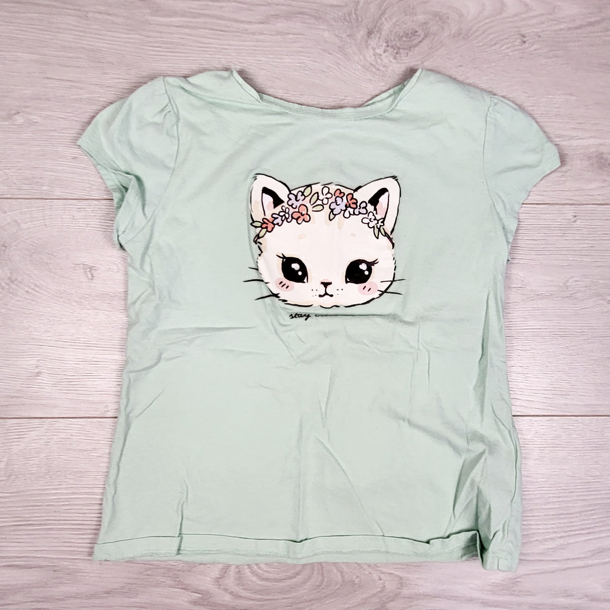 H and M mint t-shirt with cat. Size 8-10 Years