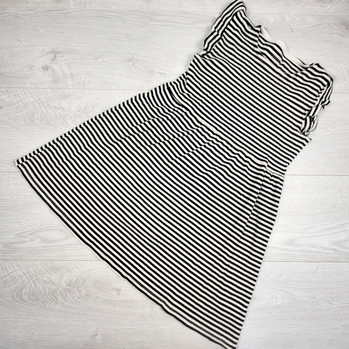 H and M black striped rib knit dress. Size 8-10 Years