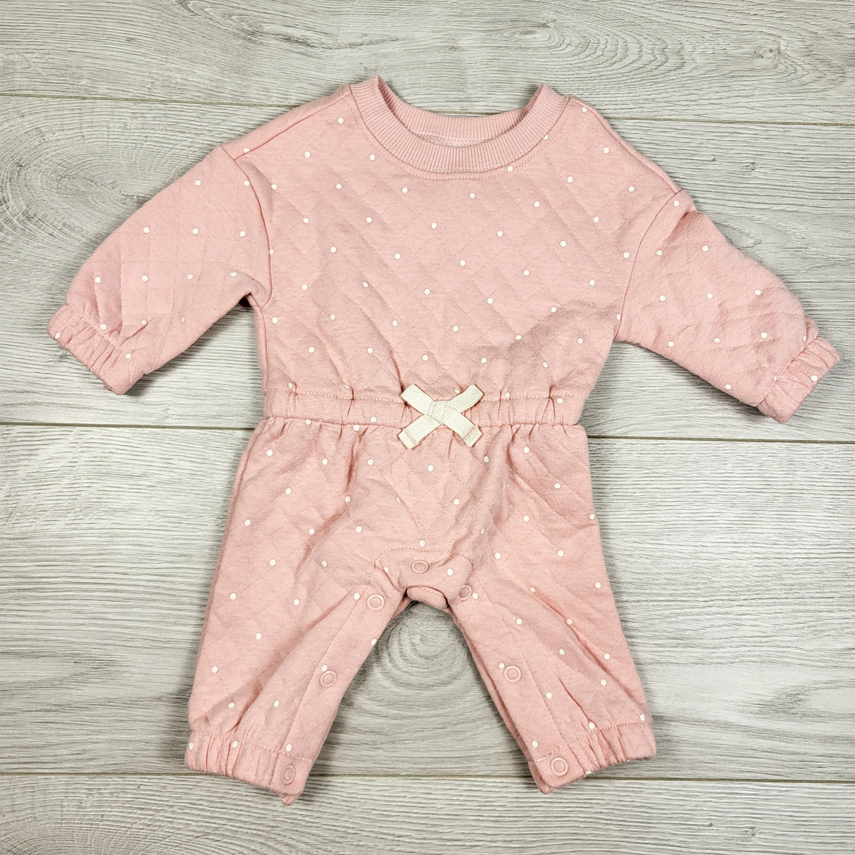 Carters pink polka dot quilted romper. Newborn size
