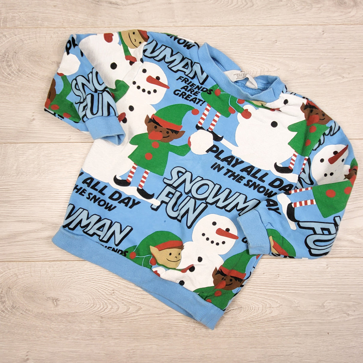 H and M blue sweatshirt with elves and snowmen. Size 2-4T - AS IS