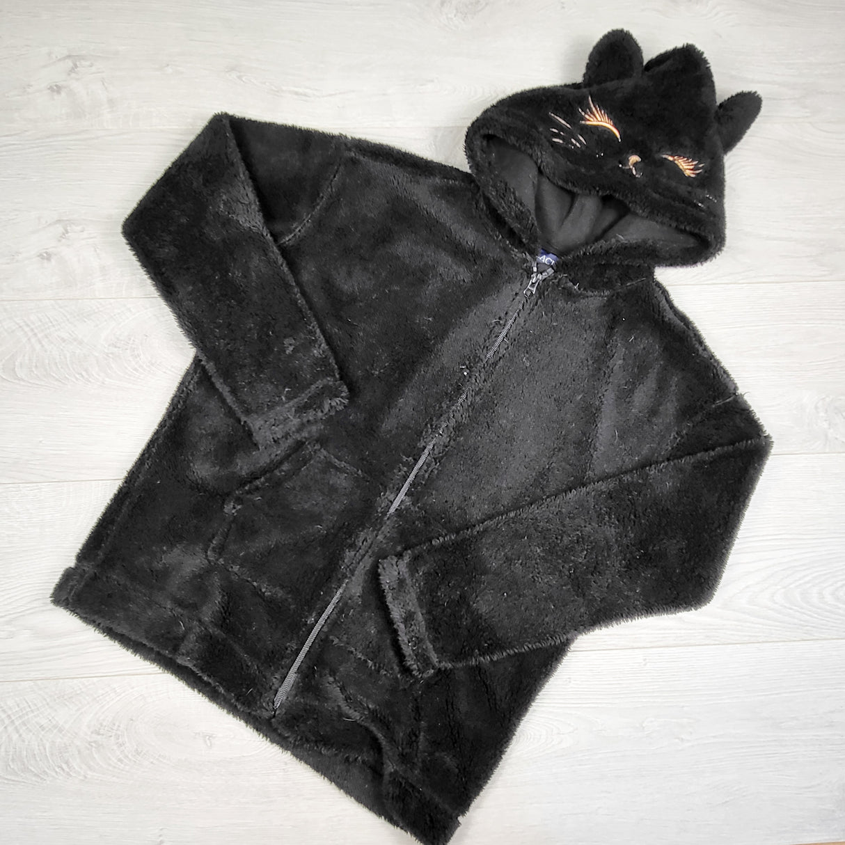 Children's Place black faux fur hoodie with car ears. Size 10/12