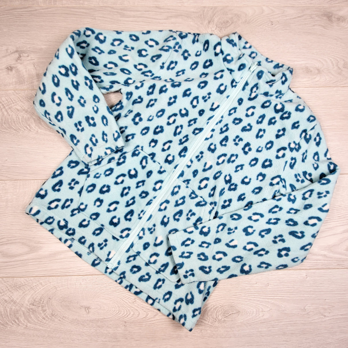 Eddie Bauer blue leopard print zip up fleece coat. Size 10/12
