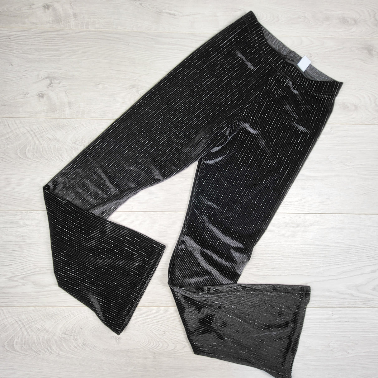 Old Navy black ribbed velour pants with sparkle threading. Size 10/12