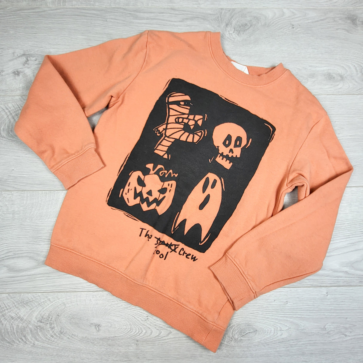 H and M orange Halloween themed sweatshirt. Size 8-10 Years