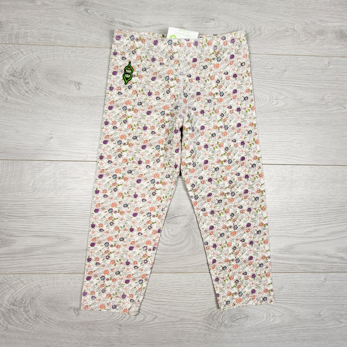 Peekaboo Beans white floral print leggings. Size 5T