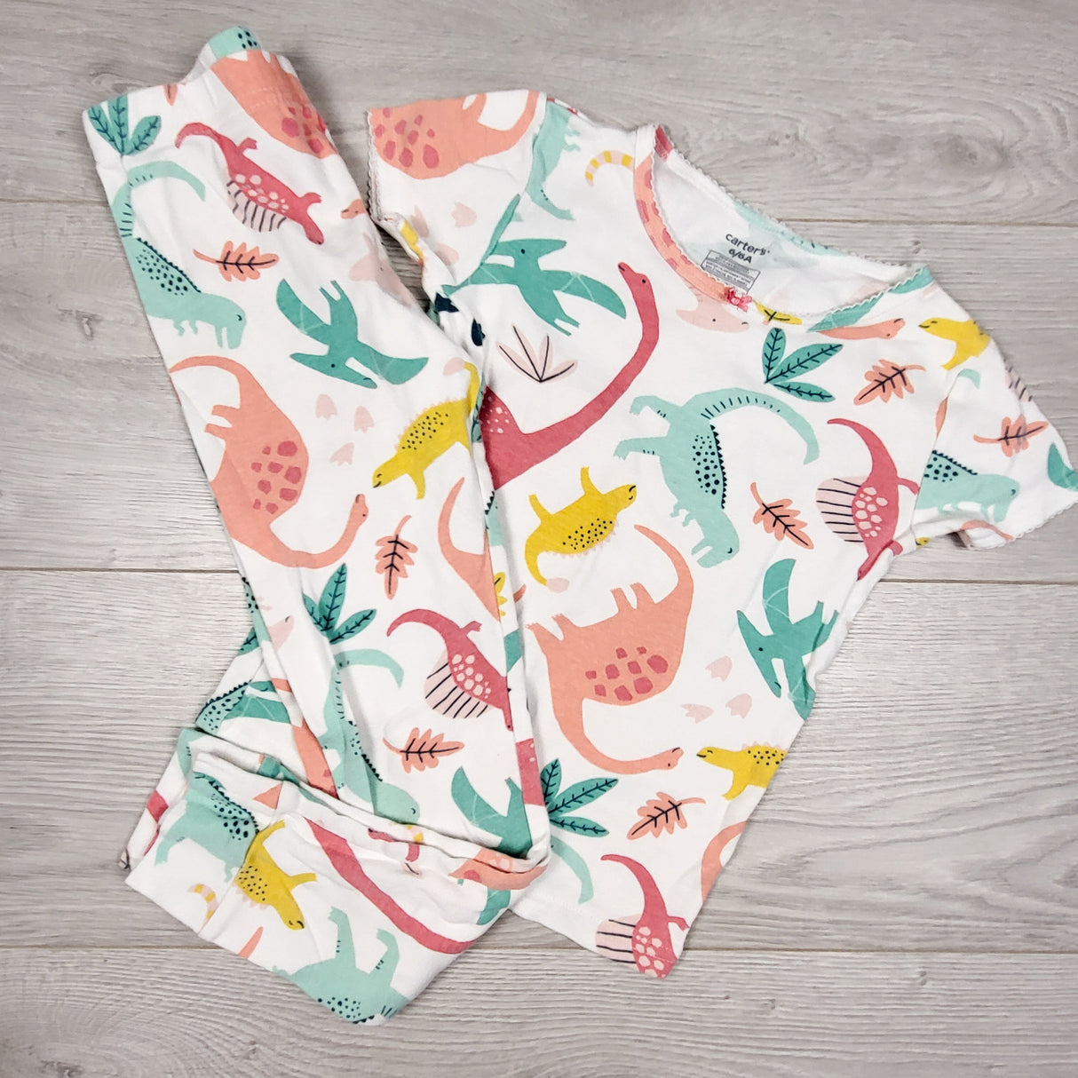 Carters white 2pc dinosaur PJs. Size 6