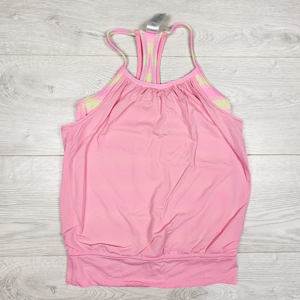 Ivivva (Lululemon) pink double dutch tank top with built in bra. Size 8
