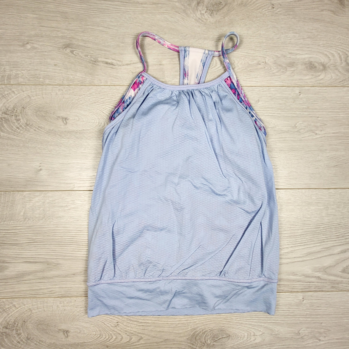 Ivivva (Lululemon) light blue double dutch tank with built in bra. Size 8