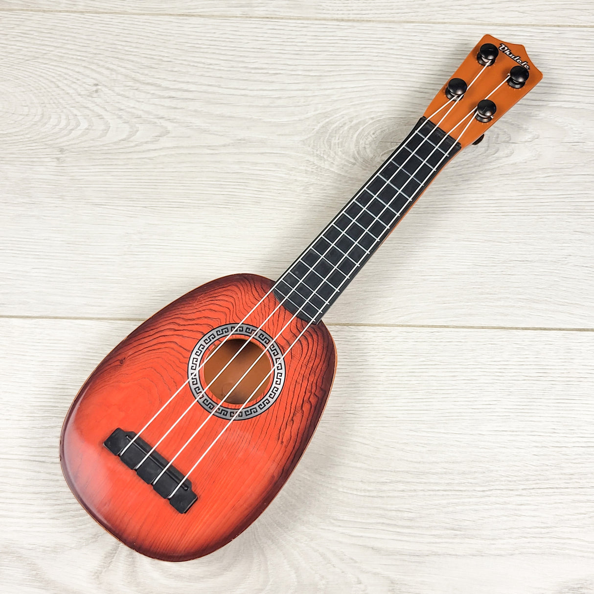 Toy ukulele (sorry, no shipping)