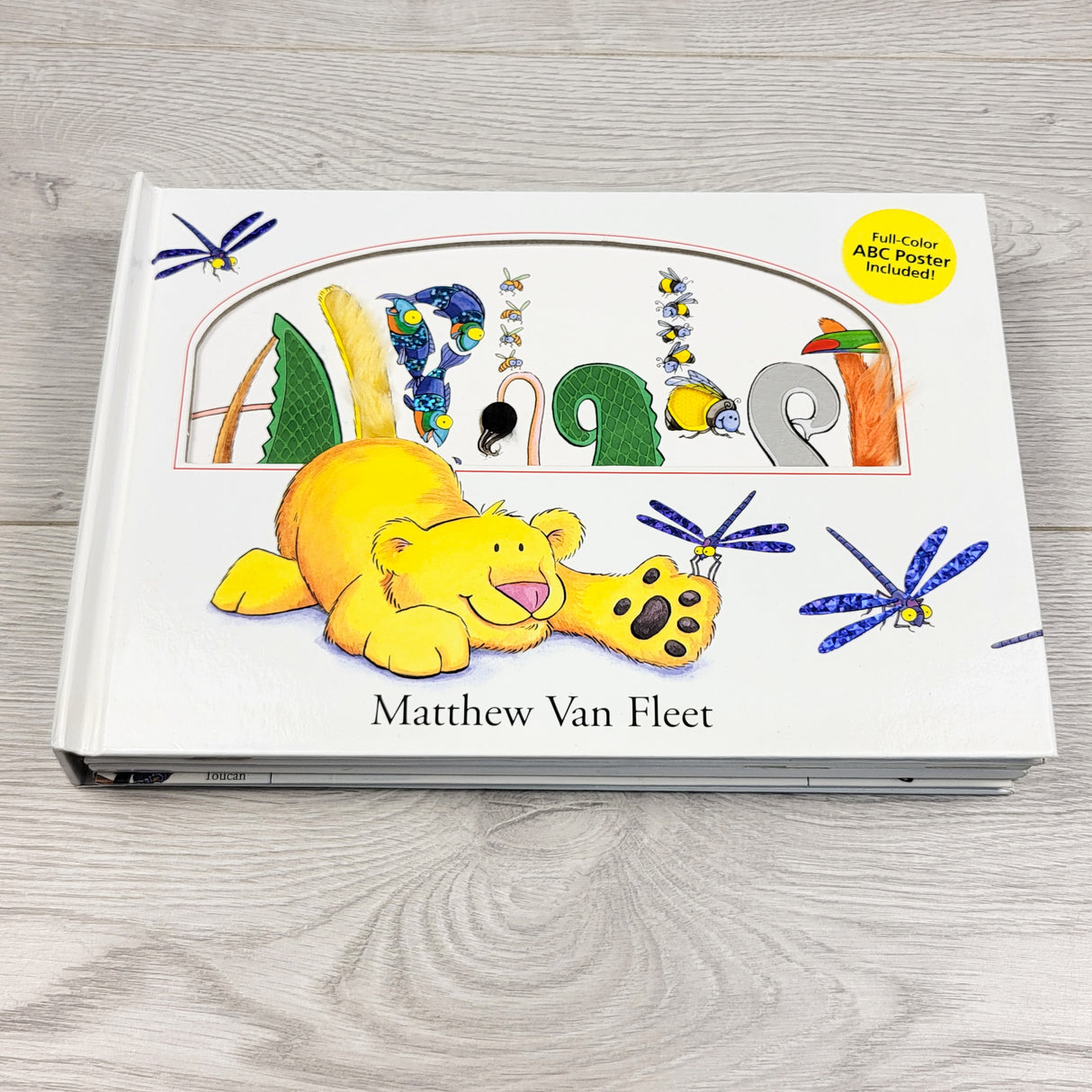 Alphabet. Hardcover sensory book with flaps, touch and feel, etc (sorry, no shipping)
