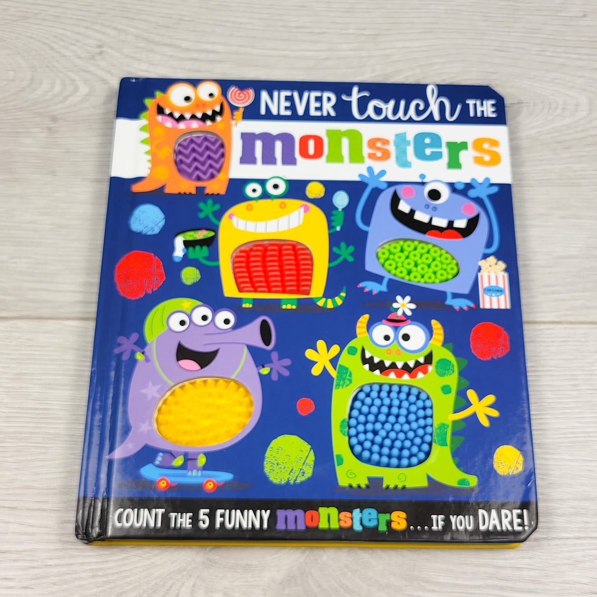 Never Touch the Monsters. Touch and feel board book