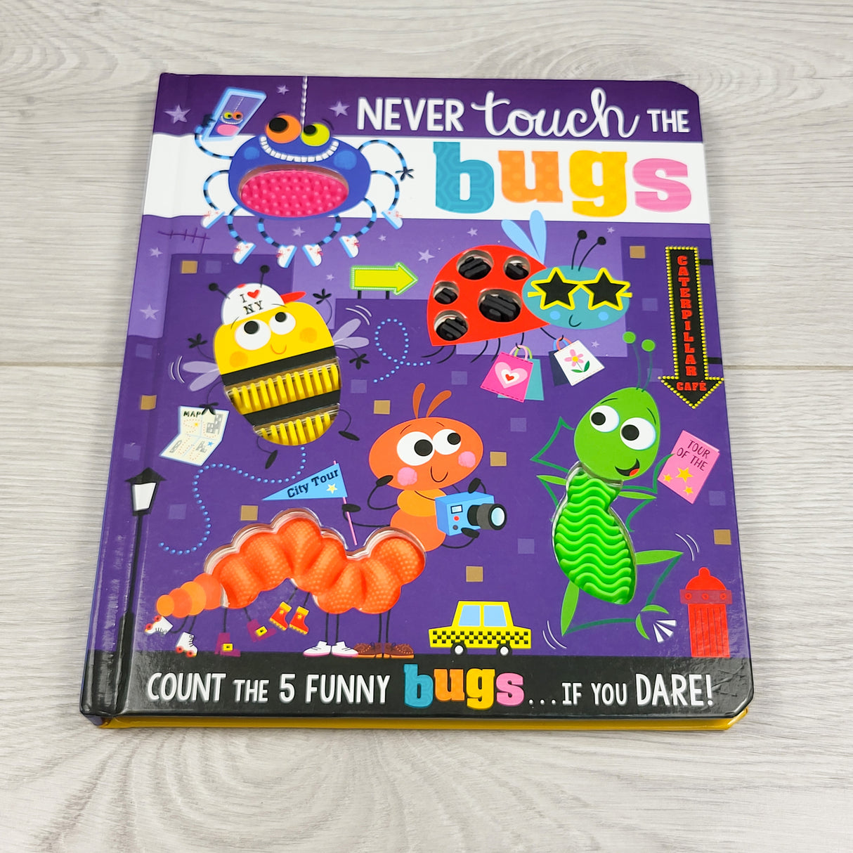 Never Touch the Bugs. Touch and feel board book