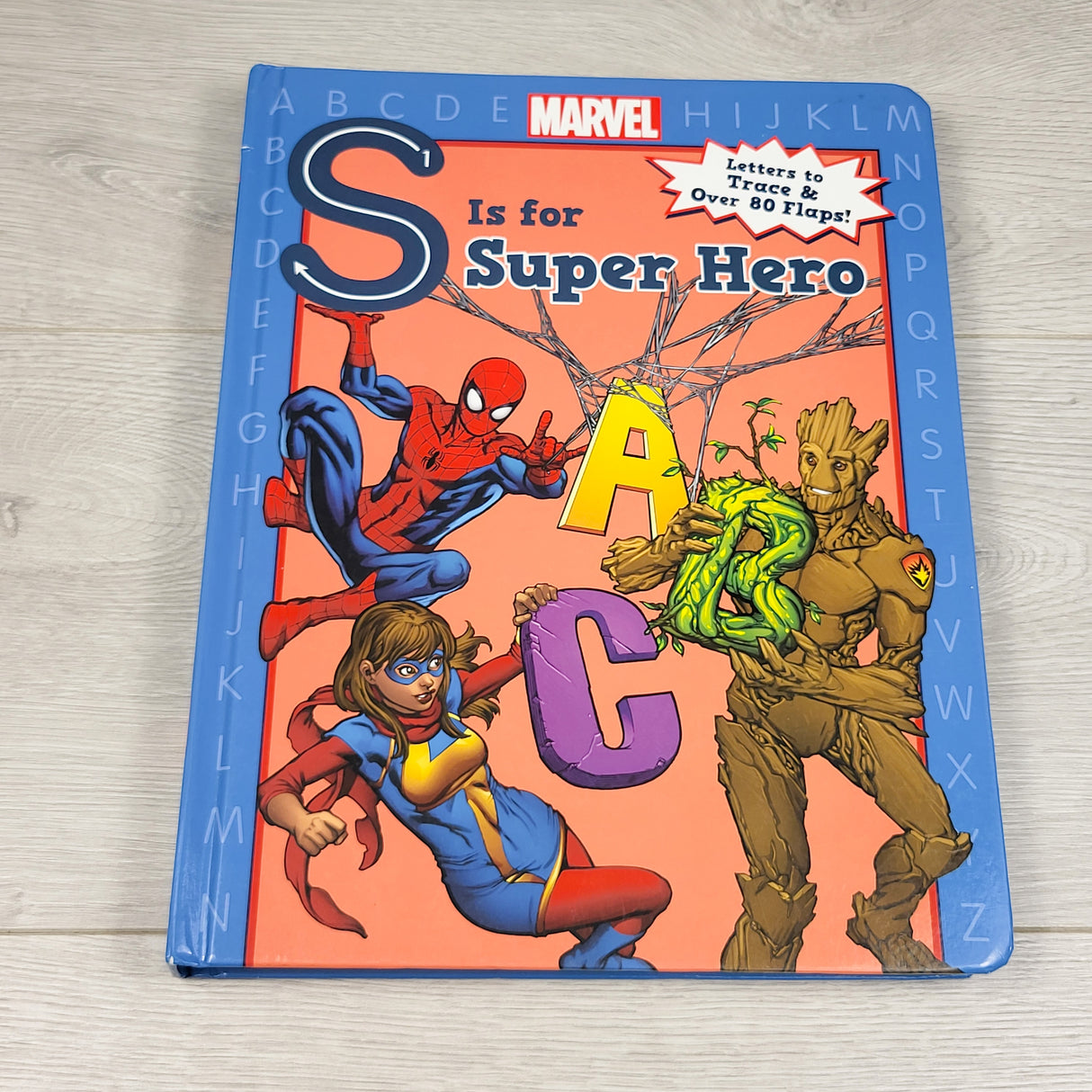 S Is For Super Heroes.  Hardcover book with lift the flaps and letter tracing (sorry, no shipping)