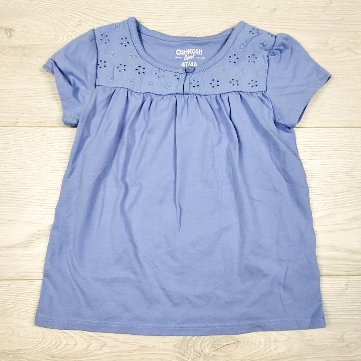 Oshkosh blue t-shirt with eyelet detail. Size 4T