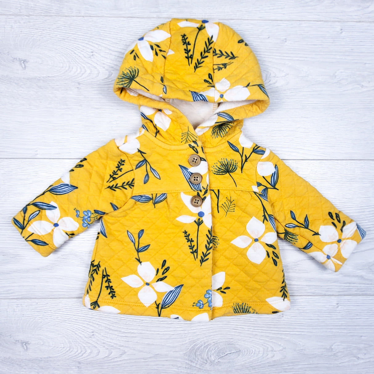 Carters yellow floral print quilted hoodie. Size 3 months