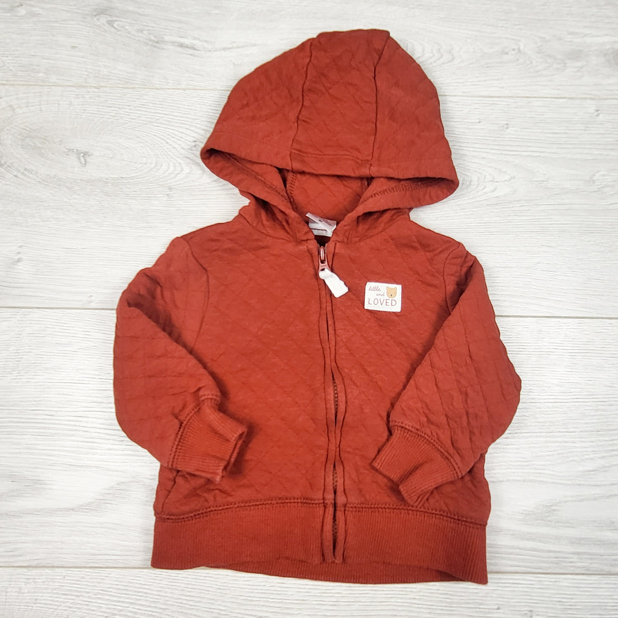 Carters rust coloured zip up hoodie. Size 3 months